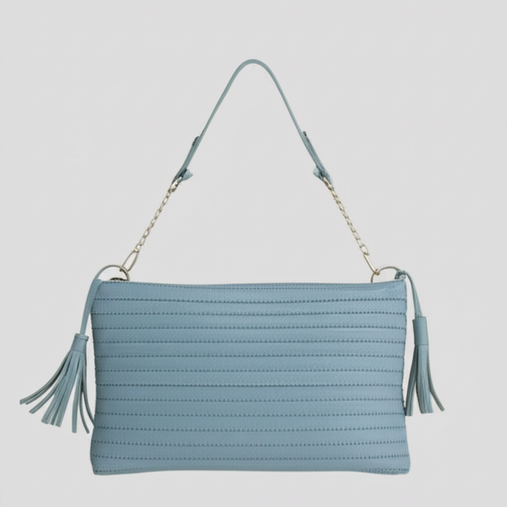 "Sky Blue Quilted Shoulder Bag with Tassel Accents"