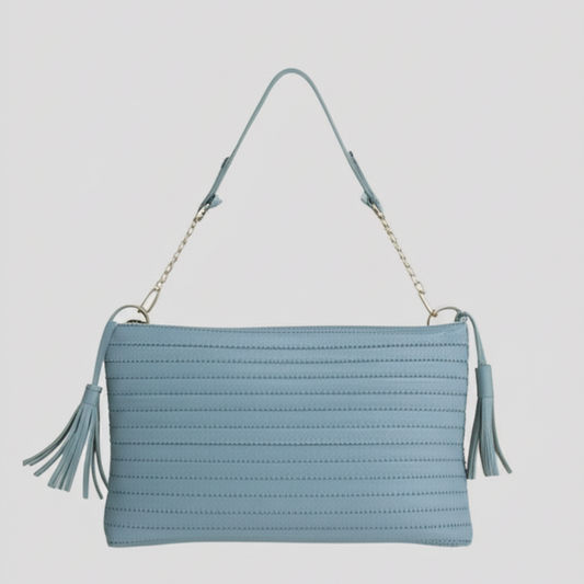 "Sky Blue Quilted Shoulder Bag with Tassel Accents"